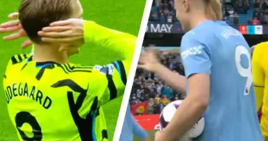 Martin Ødegaard and Erling Haaland in action during the big clash between Arsenal and Manchester City.